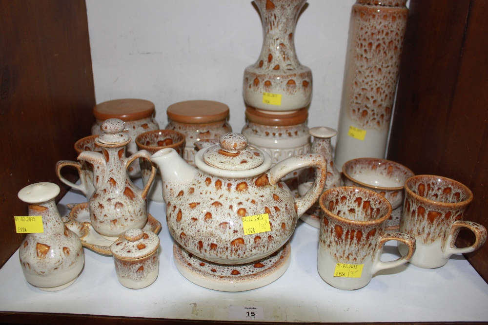 SECTION 15.  A collection of 'Fosters pottery' items including a teapot, teacups and a variety of