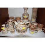 SECTION 15.  A collection of 'Fosters pottery' items including a teapot, teacups and a variety of