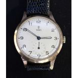 A gent's Tudor wristwatch, with fully stamped 9ct gold Rolex case, numbered 3412, white enamel