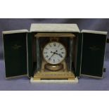 A Jaeger-Le Coultre Atmos Clock, Empire model, with green marbled columns, gilt brass case, original