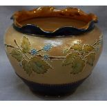 A Royal Doulton stoneware jardinière with crimped rim and blackberry and leaf banded decoration,