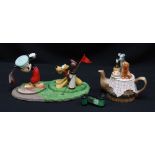 Four 'Classics collection' Walt Disney items that create a golf scene, together with a 'Cardew