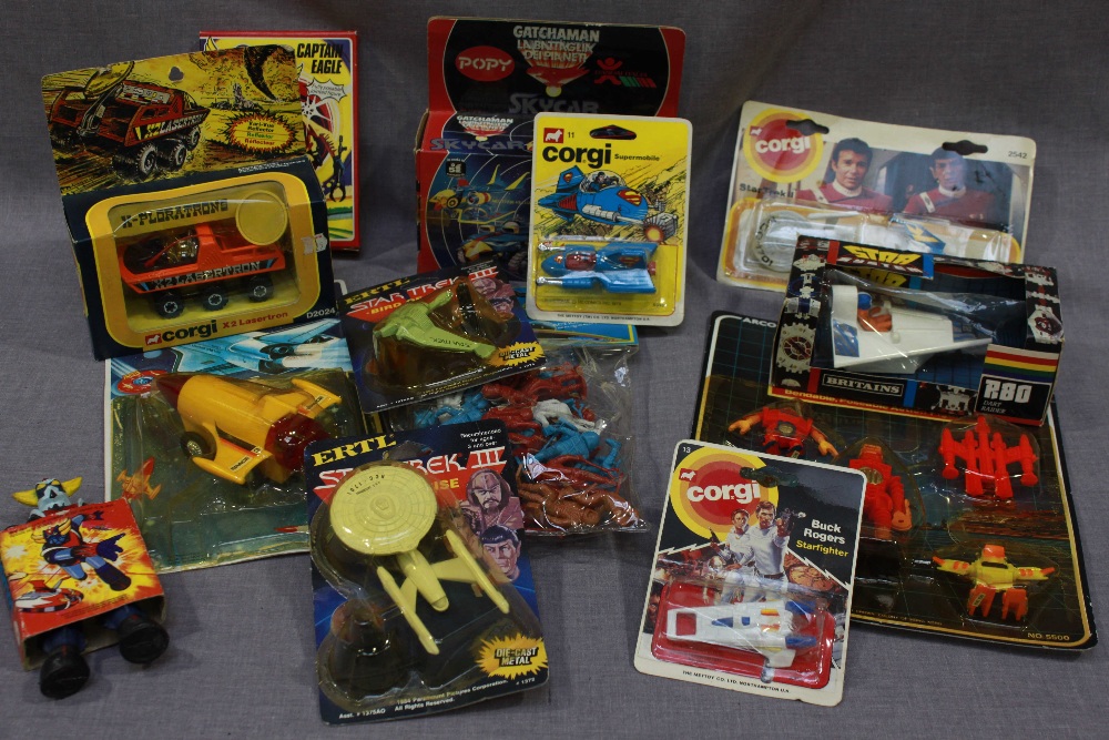 A collection of Corgi and other models of space ships and spaceman figures, Star Trek toys, in