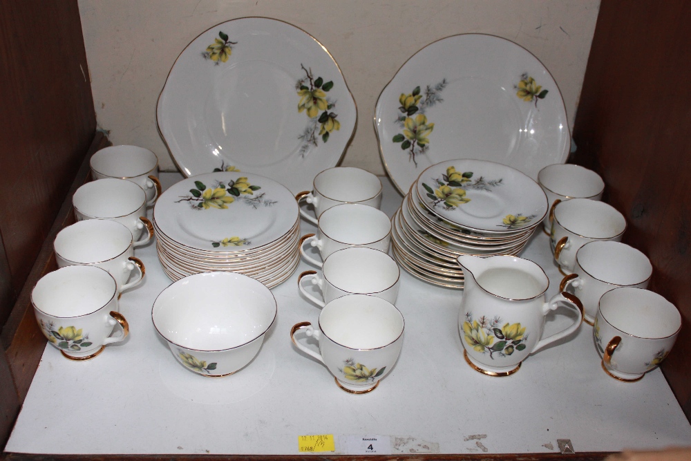 SECTION 4.  A Royal Grafton yellow rose painted double tea service.