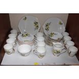 SECTION 4.  A Royal Grafton yellow rose painted double tea service.