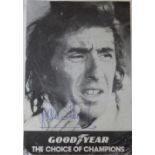 A 14cm x 10cm Goodyear black and white photo-card signed by three-time F1 Champion Jackie Stewart