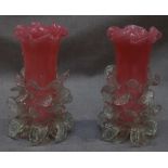 A pair of Victorian pink glass vases with clear glass moulded leaves, 16cm high