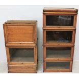 Two narrow Globe Wernicke bookcase sections, one glazed one paneled, together with four glazed