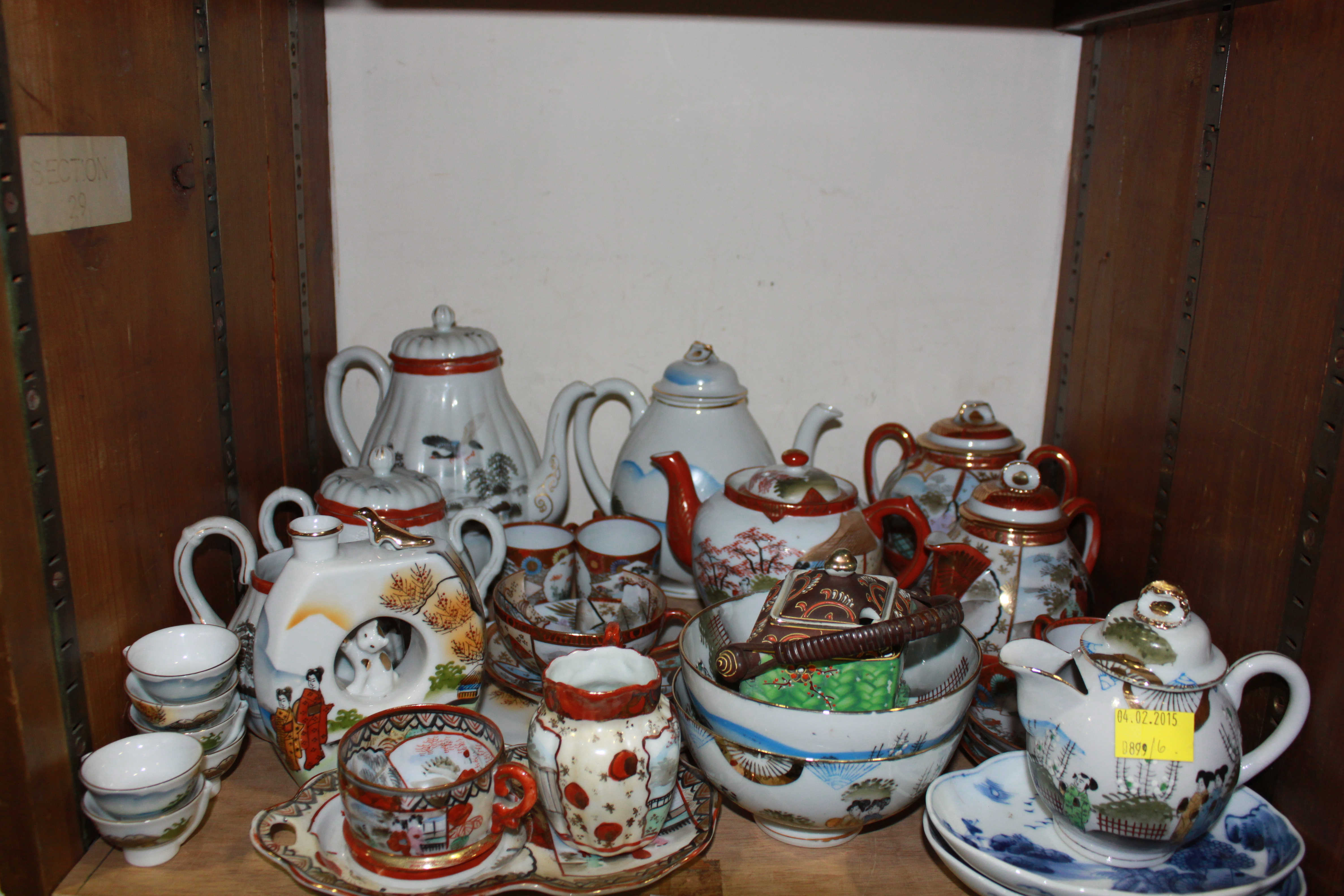 SECTION 29. A Japanese sake drinking set together with a quantity of Japanese porcelain and eggshell