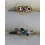 A 14ct gold and diamond dress ring further set with three marquise-cut emeralds, 2.5 grams, together