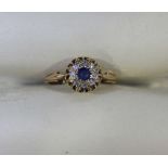 An 18ct gold round sapphire and diamond cluster ring hallmarked 1920, approx. weight of ring 2.