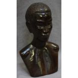 An African hardwood-carved bust of a man, 36cm high