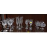 A set of six Saint-Louis large wine glasses, seven champagne flutes, six small wine glasses and