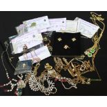 A quantity of jewellery including brooches, neck chains, watch bracelets, etc, largely of Eastern