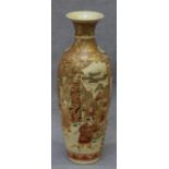 A Japanese Satsuma pottery vase decorated with reserves of children and other figures, 27cm.