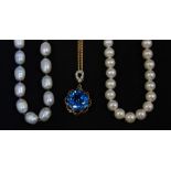 A 9ct gold necklace and blue stone pendant and two cultured pearl necklaces.