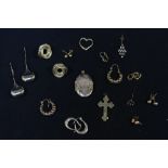 A small quantity of 9ct gold earrings, 9ct gold lockets and various unmarked yellow metal earrings