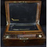 A Victorian brass bound rosewood writing slope with two 'secret' drawers.