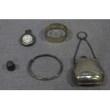 A ladies silver purse with leather lining Birmingham 1916, a Continental fob watch in engraved