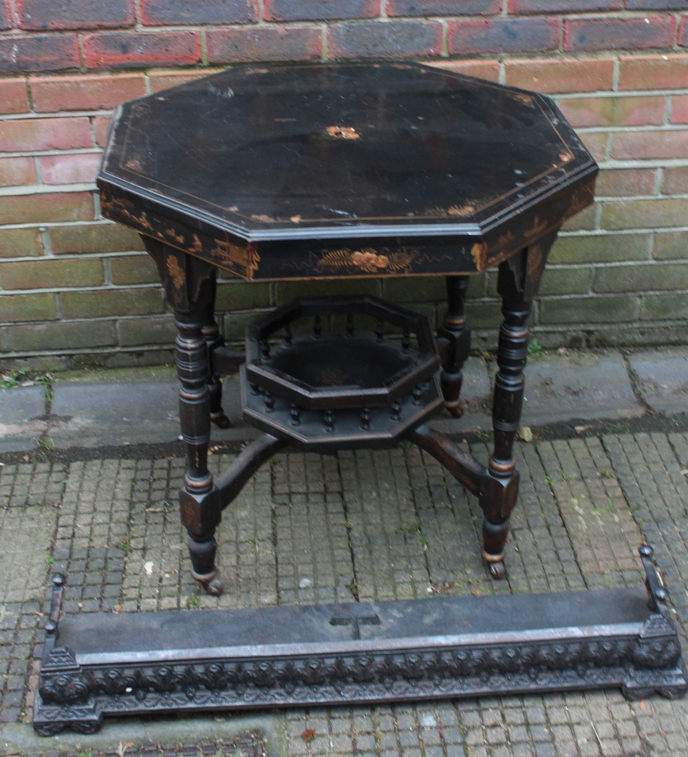 A Victorian "Japanned" octagonal occasional table with galleried under-tier, together with a