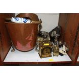 SECTION 27   A copper log bin and other metalware, two brass cased clocks. Various collectibles