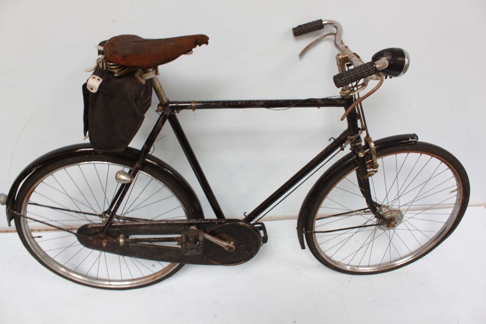 A mid 20th century gents 'ride-to-work' bicycle, with black frame, lever drum brakes, (for