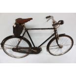 A mid 20th century gents 'ride-to-work' bicycle, with black frame, lever drum brakes, (for