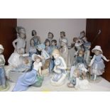 SECTION 5. A collection of 19 Nao porcelain figures