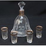 A Continental silver and cut glass liqueur set, comprising a decanter and four small glasses, all
