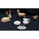 A group of three Beswick fallow deer, together with a Royal Winton chintz toast rack, a pin tray and