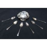 Five late Georgian silver teaspoons together with a pierced silver bon bon dish with swing