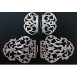 Two sets of pierced silver nurses buckles, one hallmarked London 1966 (AF), the other Birmingham