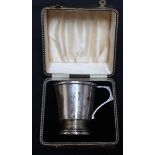 A George VI silver christening tankard, hallmarked Birmingham 1940, in a fitted case. Approx 3.4