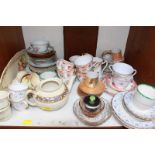 SECTION 7. A shelf of assorted china including part tea sets, cups and saucers, and a set of