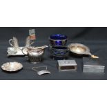 A collection of assorted silver and white metal items including a cigarette case, a wine strainer