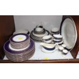 SECTION 8. A quantity of Royal Doulton Imperial Blue dinner and side plates, together with a similar