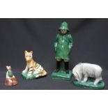 A rare group of four Fulham Pottery Winnie the Pooh pottery figures: Christopher Robin, Tigger,