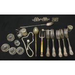 A collection of Victorian and later silver cutlery, together with a silver cruet set and salts,