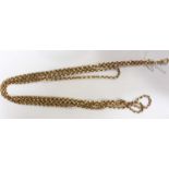 A long 9ct gold guard or muff chain. 29.4 grams.