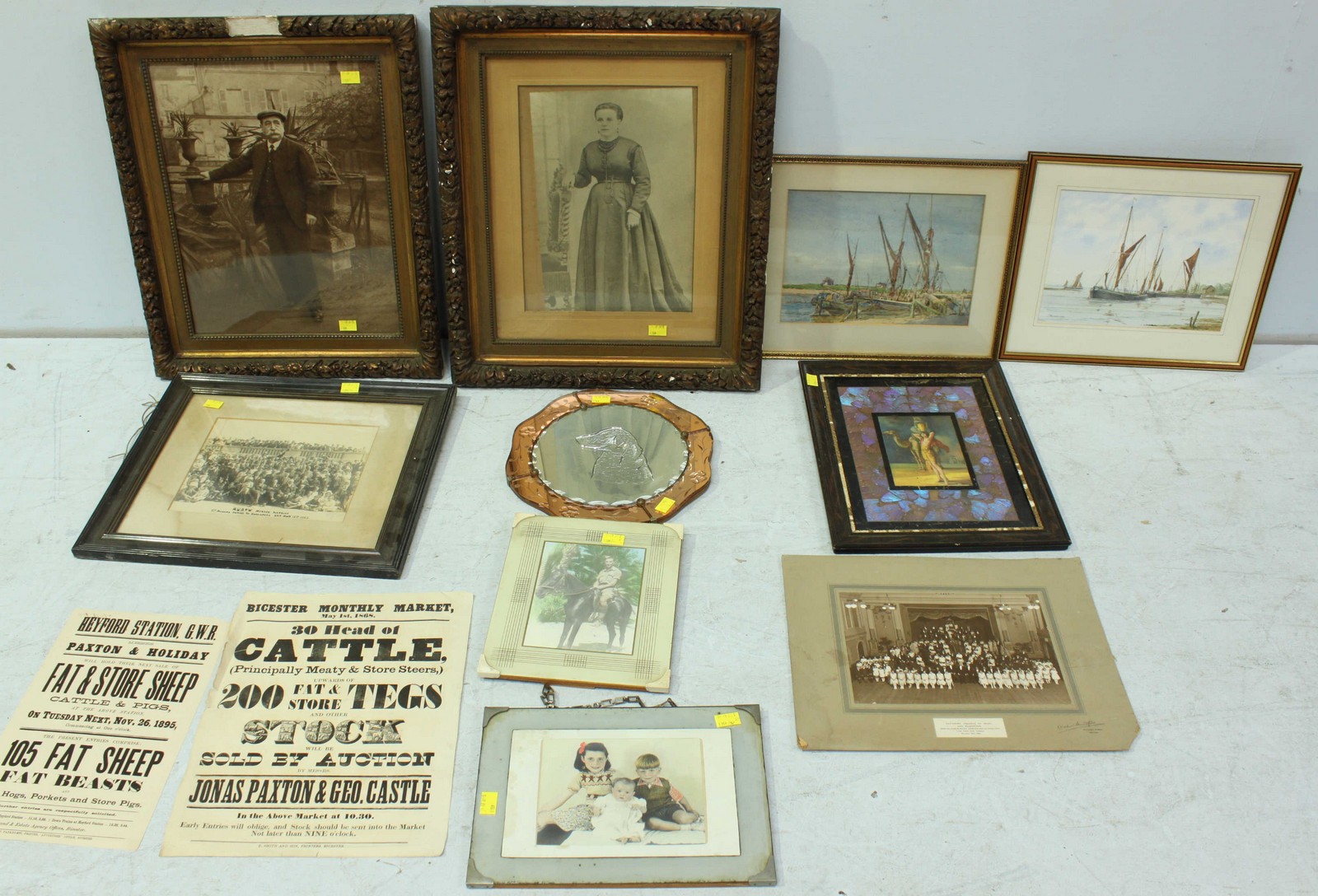 A collection of assorted prints including a pair of framed photographs, two watercolours, a mirror