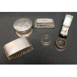 A collection of silver items including a circular jewellery box and cover (af), an engine turned