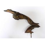 A 1930s Art Deco bronze greyhound car mascot. 17.5 cm long.