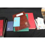 A collection of 11 large stamp albums containing British, Hong Kong and other stamps, together