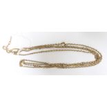 A long 9ct gold guard or muff chain. 17.2 grams.