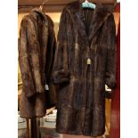 A full-length brown fur coat together with a brown three-quarter-length fur coat.