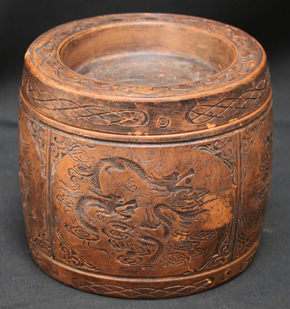 A Chinese Yixing type pottery cricket box and cover of cylindrical form, the cover and four-panelled