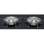 A pair of Victorian silver bonbon dishes, hallmarked London 1901, with pierced body and twin