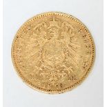 An 1873 German 20 Mark gold coin, inscribed 'Ludwig II Koenig V. Bayern'. 7.9 grams.
