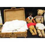 A collection of three teddy bears and a golly, together with a quantity of linen.