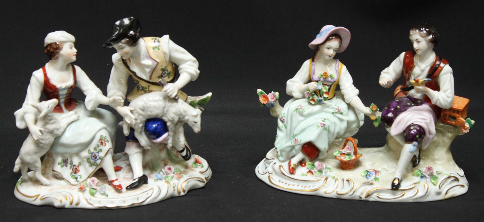 A pair of Sitzendorf porcelain pastoral figure-groups, the first modelled as a couple sheering